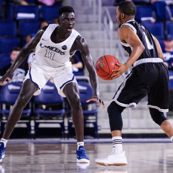 California Baptist's Bul Kuol (11) defends against Hawaii Pacific's Amiri Chukwuemeka (1) in the first half of a men's basketball game at California Baptist University in Riverside, Calif. on Monday, Jan. 15, 2017. CBU Lancers defeated Hawaii Pacific, 73-60. (Photo by Rachel Luna, The Press-Enterprise/SCNG)